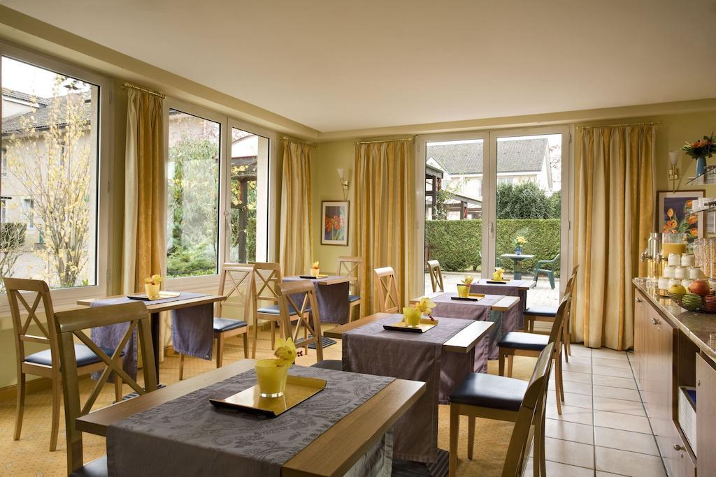 Citadines Geneve Ferney Voltaire Aparthotel Restaurant bilde